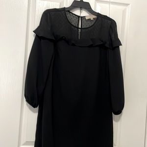 Black dress with ruffle detailing